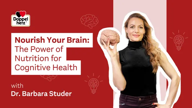 A woman with long hair poses while holding a model of a brain. The text beside her reads "Nourish Your Brain: The Power of Nutrition for Cognitive Health" with the name "Dr. Barbara Studer" below. The background features lightbulbs and brain illustrations, emphasizing cognitive wellness.